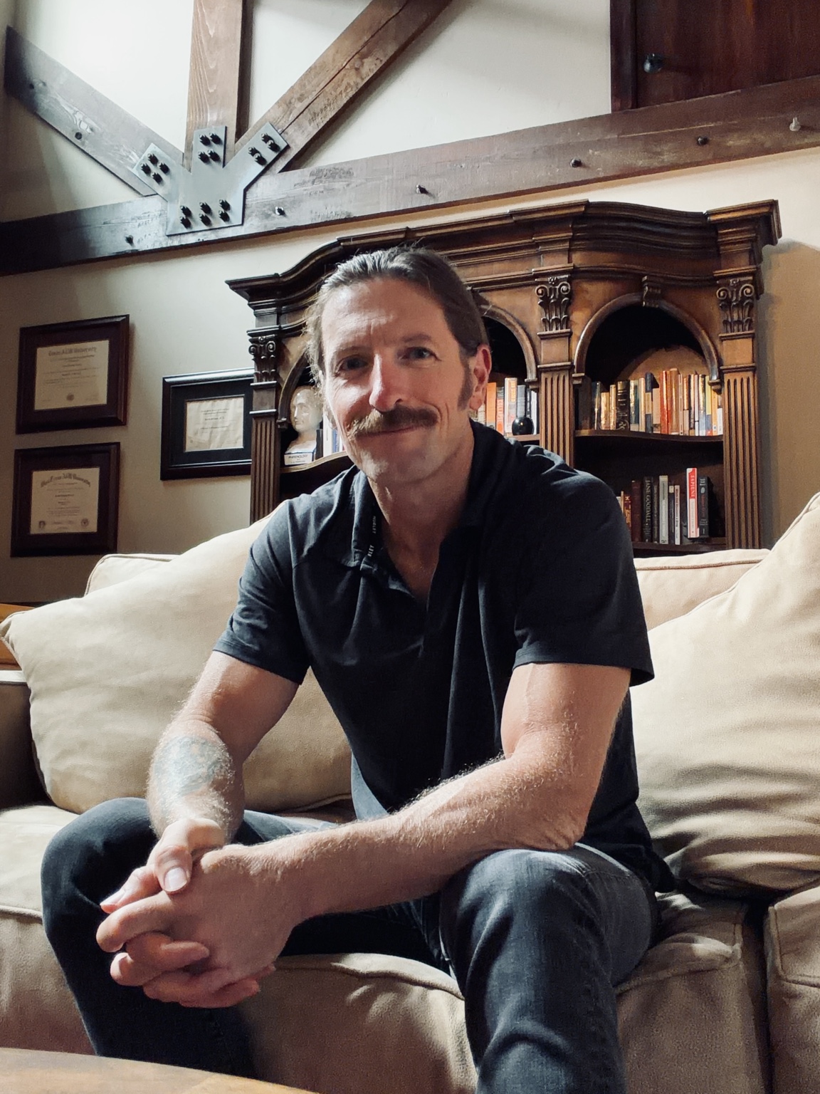 David Stroud, LPC, seated in his counseling office